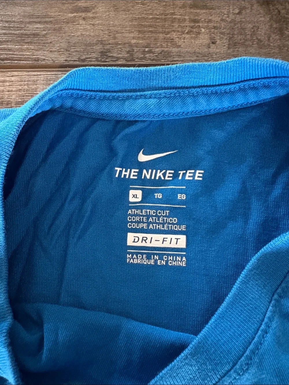 Nike Blue Short Sleeve Tee with Football Helmet Graphic